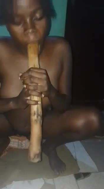 African girl from the village  got horny and took out a wooden  stick that looks  like a dildo🍆 to pleasure herself